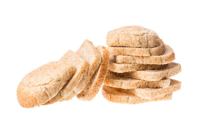 Tasty sliced fresh bread pieces isolated on white background.
