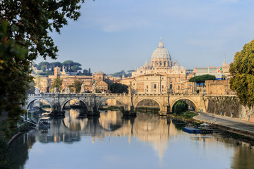 Fototapeta na wymiar Angels bridge, St. Peters basilica and river Tibra, Rome, Italy