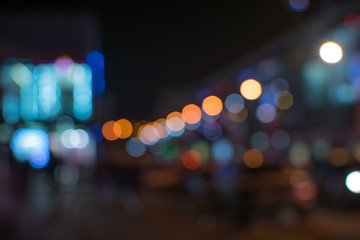 Abstract blurred defocused background with colorful bokeh. Night City Street with lights out of focus