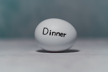 An inscription on a chicken egg for a reminder of the diet. Dinner.