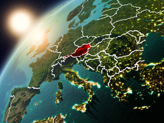 Austria on planet Earth in sunset