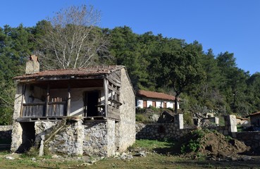Fototapeta na wymiar Old, forgotten house in the Turkish village of Camli.Marmaris.Turkey
