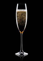 Elegant glass of yellow champagne with bubbles