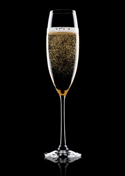 Elegant glass of yellow champagne with bubbles