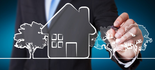 Businessman drawing manuscript real estate plan project