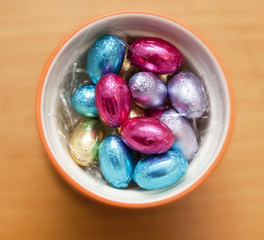 Chocolate eggs inside a cup
