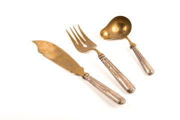 silver set of knife fork and spoon for sauces and salads