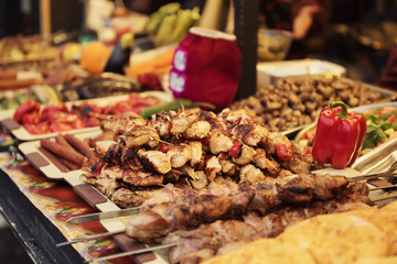 Barbeque meat stick at street christmas market, traditional ukraininan cuisine