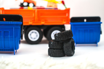 Tires near the garbage cans