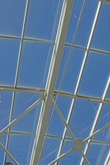 Glass roof with metal frame.
