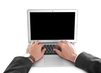 Young man using his laptop on white background