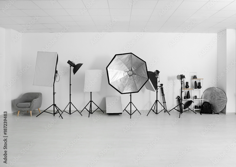 Wall mural professional equipment in modern photo studio