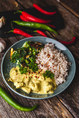 Handmade chicken curry tikka masala with basmati rice and brocco