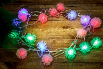 Christmas background with garlands on the table