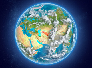 Obraz na płótnie Canvas Uzbekistan on planet Earth in space