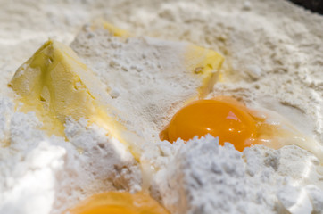 Egg, butter and flour in the bowl
