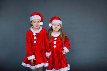 two girls Santa helpers dress