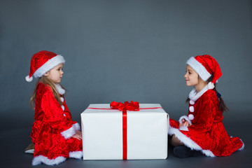 two Santa helpers big gift box