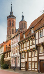 Fototapeta na wymiar Historic houses and church towers in Gottingen