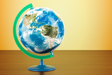 Geographical globe of planet Earth on the wooden table. 3D rendering