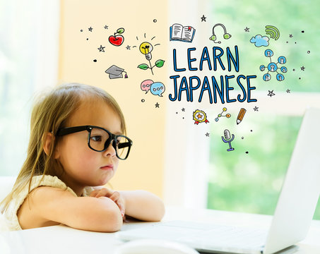 Learn Japanese text with little girl using her laptop
