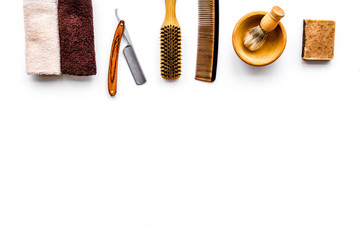 Tools beard and moustaches' care. Razor and brush on white background top view copyspace