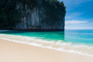 view of the cliff and turquoise water of the Andaman Sea, Hong Island, Thailand