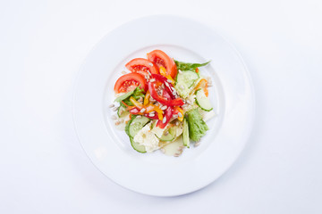 fresh salad on white plate