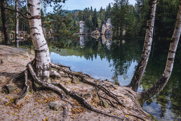 Fototapeta na wymiar Lake shore in Adrspach Rocks, part of Adrspach-Teplice landscape park in Broumov Highlands region of Czech Republic