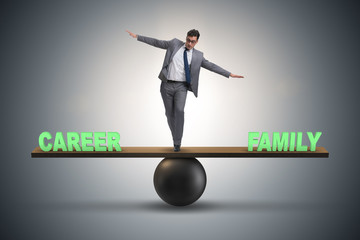 Businessman balancing between career and family in business conc