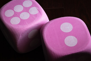close up image of two large pink dice