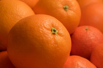 a lot of fresh oranges close up