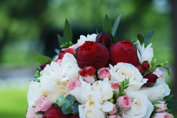 Close up of Pink and White Wedding Peonny and Roses Flowers with Eucalyptus Brunch