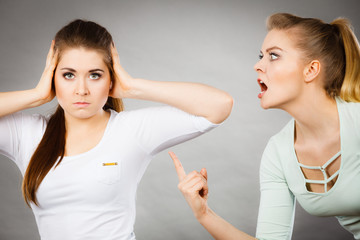 Two women having argue