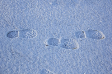 shoe boots footprints in the snow