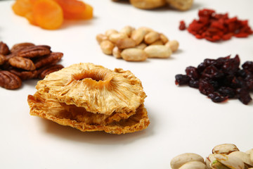 piles of Mixed dried fruits and nuts - symbols of jewish holiday Tu Bishvat