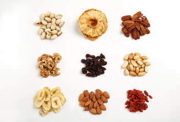 piles of Mixed dried fruits and nuts - symbols of jewish holiday Tu Bishvat