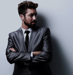 Close up portrait of a smiling handsome business man  over white