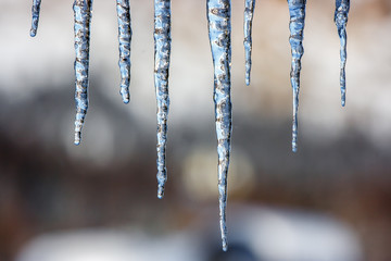 Icicles coming down from a roof, Cortina D'Ampezzo, Italy