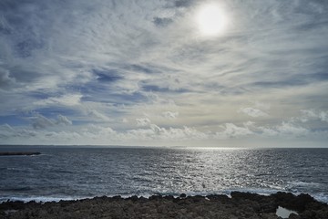 Day with cloudy sky looking at Gallipoli on the horizon in Salento - Italy