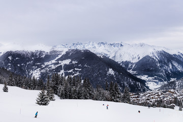 Fototapeta na wymiar Winter view on the valley in Swiss Alps, Verbier, Switzerland