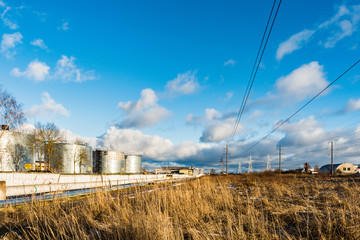 energy system is located on the outskirts of the city, between the electrical supports hang wires