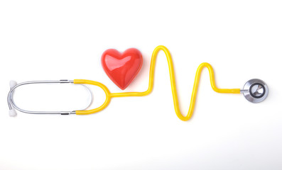 Red heart and a stethoscope on white background