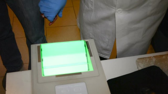 Fingerprints, taking fingerprints on scanner for identification