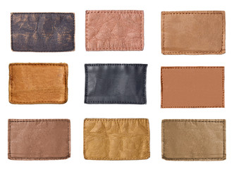 collection of various  jeans labels on white background. each one is shot separately.