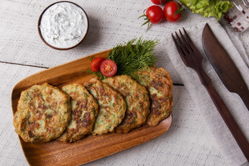 pancakes zucchini fritters vegetarian dish yogurt sauce