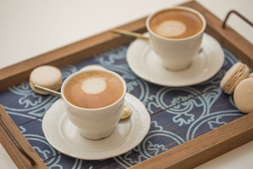 cups of coffee and macaroons