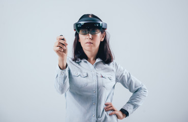 Woman wearing augmented reality goggles.