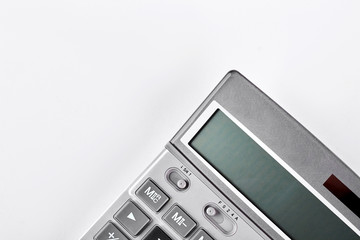 Grey electronic calculator, cropped image. Silver digital calculator isolated on white background.