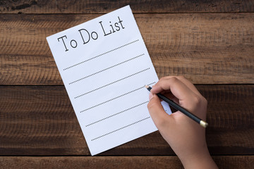 empty to do list with pencil on wooden table.lifestyle concept